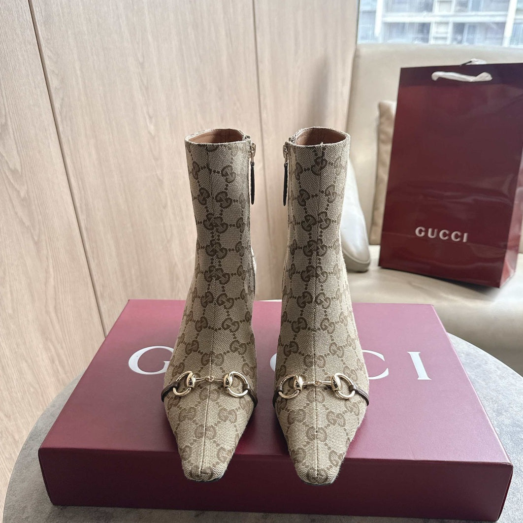 Gucci Trinity Booties crafted from vintage sand GG