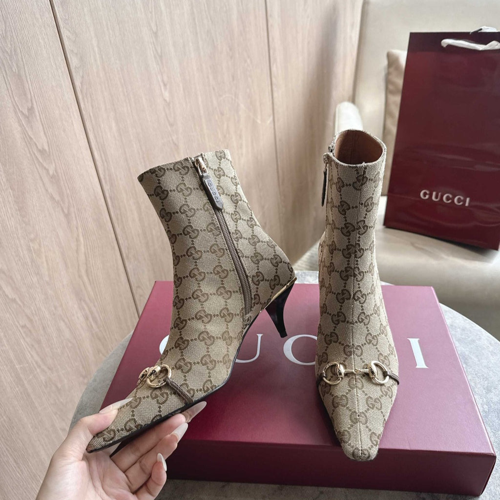Gucci Trinity Booties crafted from vintage sand GG