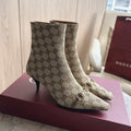 Gucci Trinity Booties crafted from vintage sand GG