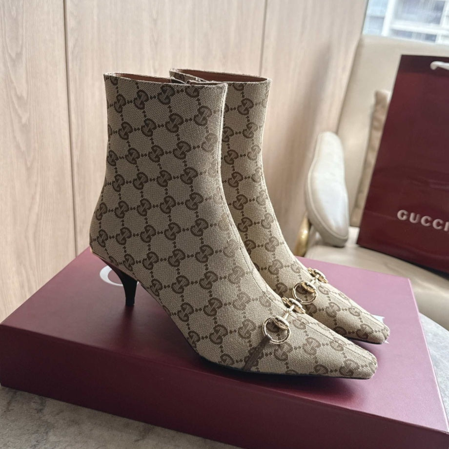 Gucci Trinity Booties crafted from vintage sand GG