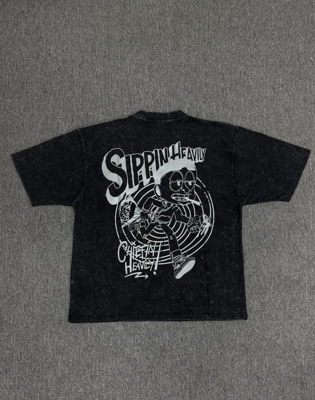 vintage-style graphic t- shirt featuring a cartoon Buddha and a cat
