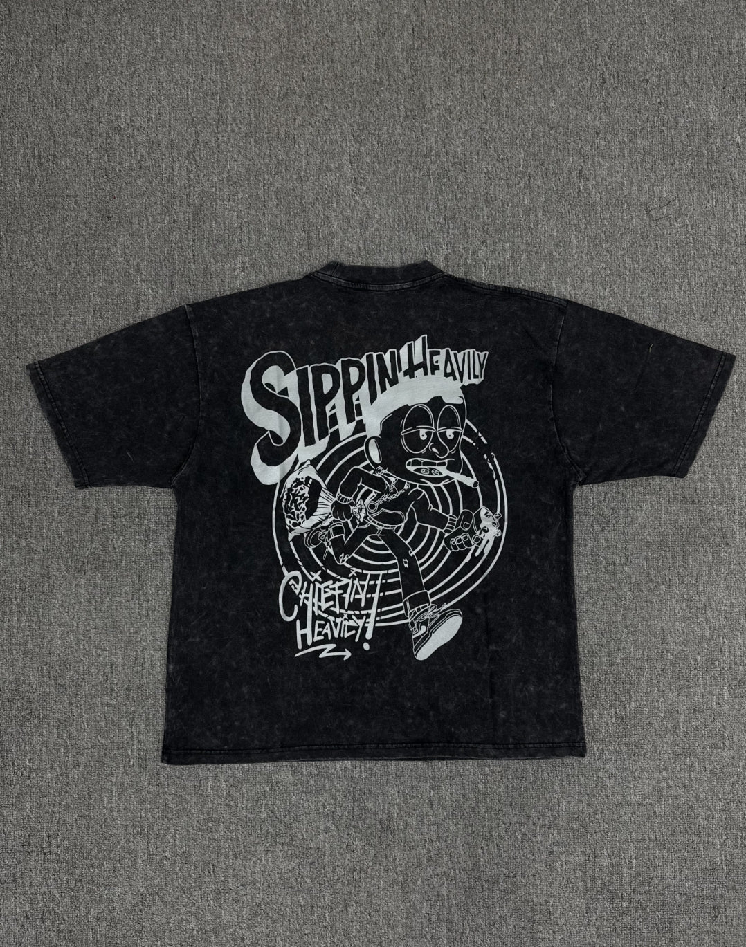 vintage-style graphic t- shirt featuring a cartoon Buddha and a cat