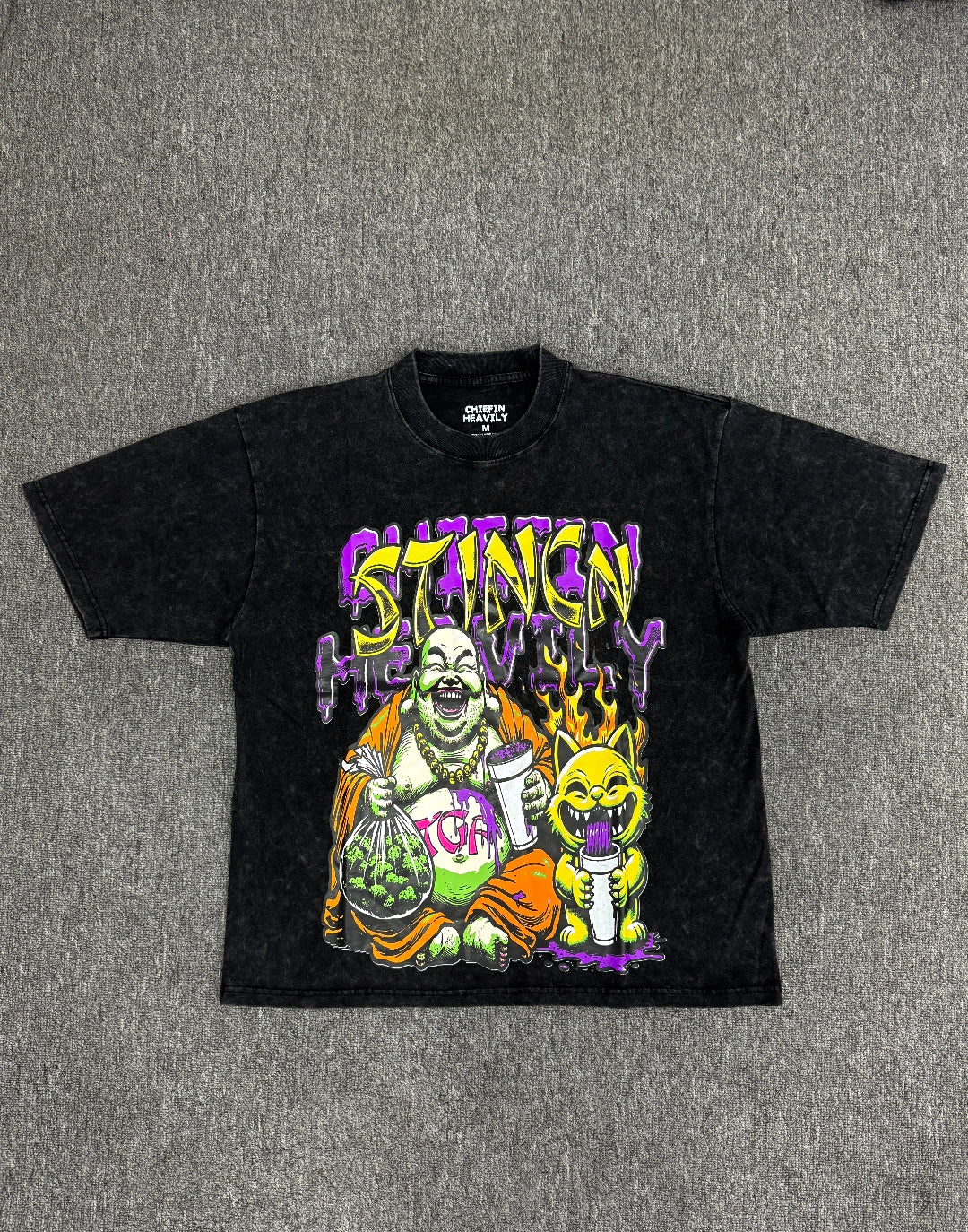 vintage-style graphic t- shirt featuring a cartoon Buddha and a cat